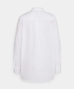 CLOSED Femme Chemisier Blanc - Chemise Élégante pour Femme -Promos CLOSED Magasin 04e3d9c94887467f8dd6423f17ea1e66